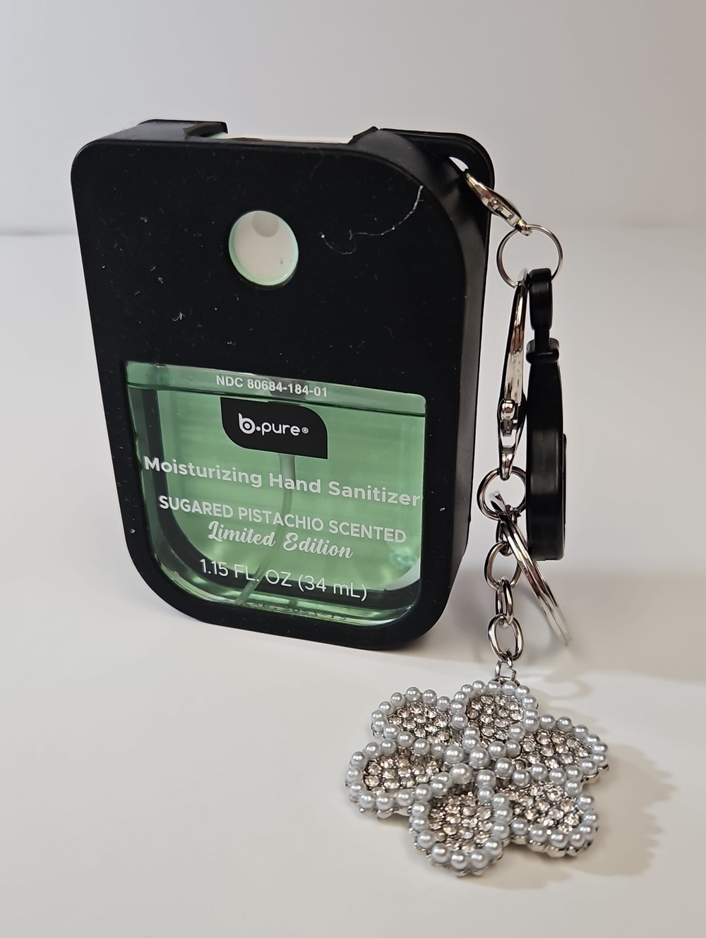 b•pure LIMITED EDITION SUGARED PISTACHIO SCENTED HAND SANITIZER, CASE + KEYCHAIN